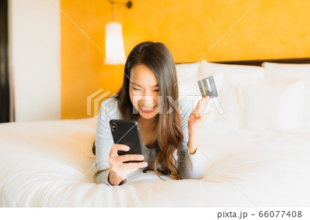 Portrait beautiful young asian woman with container cardboard parcel box Portrait beautiful young asian woman with container cardboard parcel box 66077408