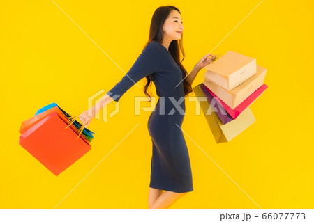 Portrait young asian woman using laptop computer 66077773