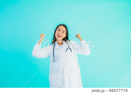 Portrait young asian woman using laptop computer Portrait young asian woman using laptop computer 66077776