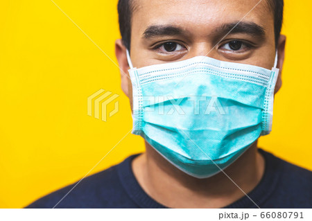 Man is wearing masks to protect against Corona virus 66080791