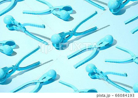 device for making snowballs, pattern on blue device for making snowballs, pattern on blue 66084193