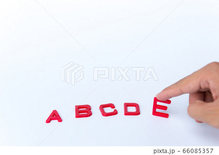 Red English alphabet on a white background with 66085357