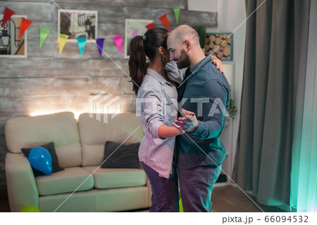 Happy romantic couple having fun in a new home 66094532