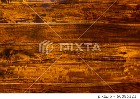 parquet from solid Sucupira wood (Bowdichia Nitida Benth or more commonly known as Brazilian Chestnut). sample of parquet. texture or background. wood texture. board. painted with natural oil. wax.  66095323