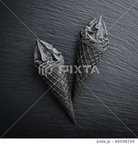 Black ice cream in cone Black ice cream in cone 66098294