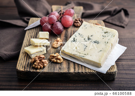 Slice of Gorgonzola cheese Slice of Gorgonzola cheese 66100588