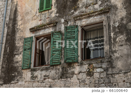 House with opened windows. 66100640