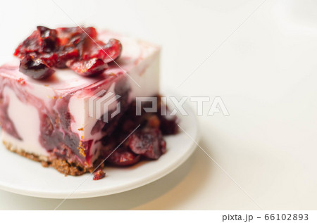 Japanese cheesecake with cherry sauce and fresh Japanese cheesecake with cherry sauce and fresh 66102893