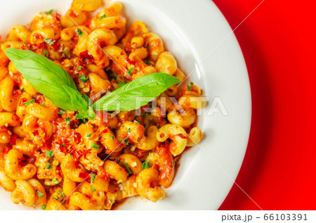 Cooked cellentani pasta with cooked chicken breast Cooked cellentani pasta with cooked chicken breast 66103391
