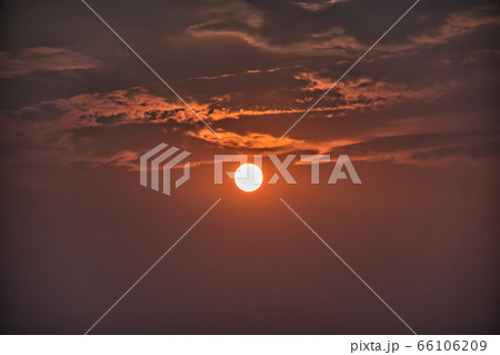 Sky with clouds during a golden sunset Sky with clouds during a golden sunset 66106209