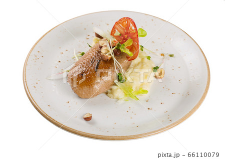 Grilled duck breast with mashed potato garnish. Grilled duck breast with mashed potato garnish. 66110079