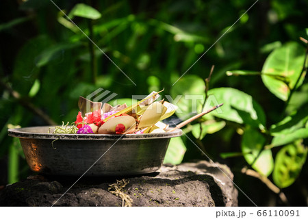 Traditional balinese offerings to gods in Bali 66110091