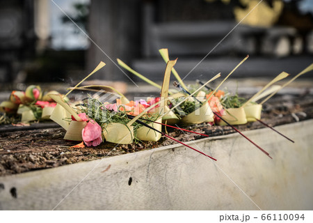 Traditional balinese offerings to gods in Bali 66110094