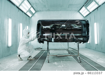 Man is a color technician car painting  66113337