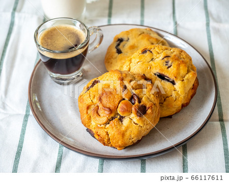 Chewy chocolate chip soft cookies with cup of Chewy chocolate chip soft cookies with cup of 66117611