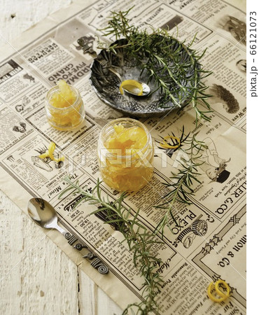 orange marmalade in small glass jars with 66121073