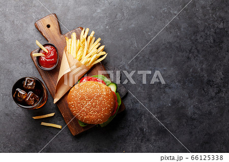 Sandwich, potato fries chips and cola Sandwich, potato fries chips and cola 66125338