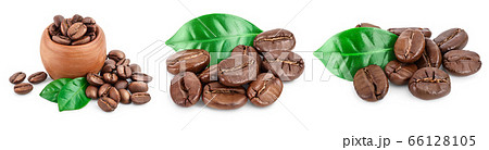 Heap of roasted coffee beans with leaves isolated on white background . Set or collection 66128105
