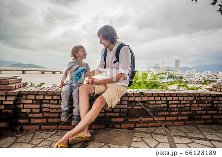 Father and Toddler Son tourists in Vietnam. Po Nagar Cham Tovers. Asia Travel concept. Father and Toddler Son tourists in Vietnam. Po Nagar Cham Tovers. Asia Travel concept. 66128189