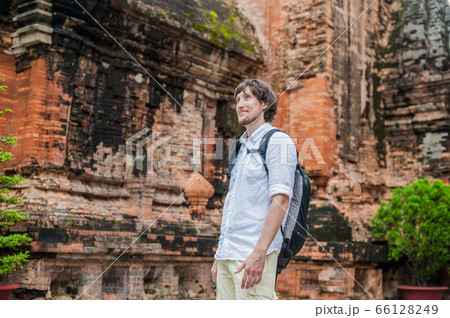Man tourist in Vietnam. Po Nagar Cham Tovers. Asia Travel concept. Man tourist in Vietnam. Po Nagar Cham Tovers. Asia Travel concept. 66128249