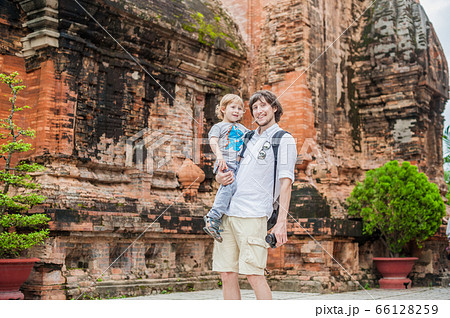 Father and Toddler Son tourists in Vietnam. Po Nagar Cham Tovers. Asia Travel concept. 66128259