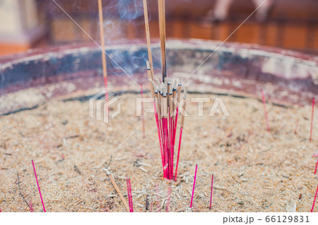 Buddhist prayer sticks inside temple Buddhist prayer sticks inside temple 66129831