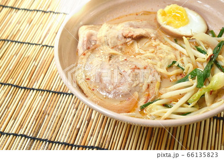 miso ramen or Japanese yellow noodles topping slice braised pork in soybean soup on bowl miso ramen or Japanese yellow noodles topping slice braised pork in soybean soup on bowl 66135823