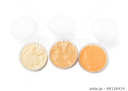 Three dip sauces in a plastic take away container 66136424