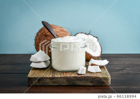 Coconut cream in a glass jar with fresh coconut 66138994