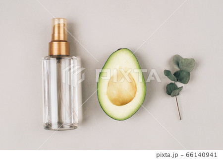 A bottle with a cosmetic product for skin care. A bottle with a cosmetic product for skin care. 66140941