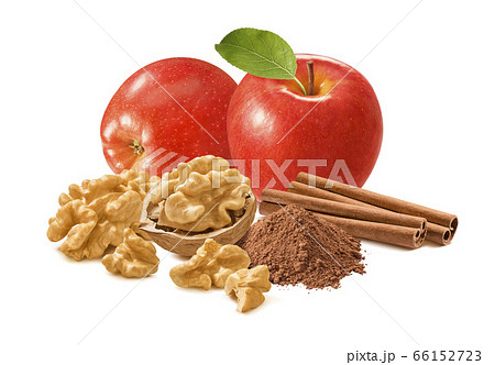 Red apple, walnuts, cinnamon sticks and powder 66152723