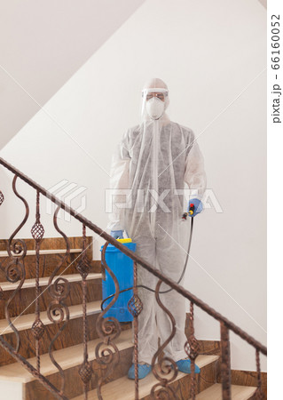 Disinfectant working in protective suit Disinfectant working in protective suit 66160052