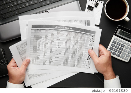 Top view of businessman's hands working with Top view of businessman's hands working with 66161380