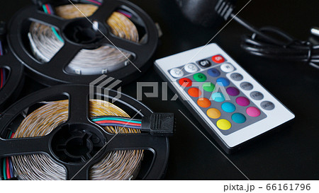 Led strip coils closeup. Diode with control panel for switching colors Led strip coils closeup. Diode with control panel for switching colors 66161796