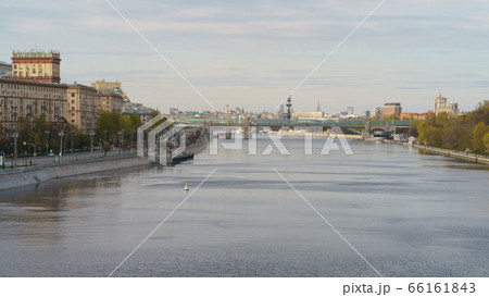 Moskva River embankment, Gorky Park is popular for walking. Coronavirus pandemic. Rest for nature. Peter the Great Statue, Kremlin, Andreevsky (Pushkinsky) pedestrian bridge in distance Moskva River embankment, Gorky Park is popular for walking. Coronavirus pandemic. Rest for nature. Peter the Great Statue, Kremlin, Andreevsky (Pushkinsky) pedestrian bridge in distance 66161843