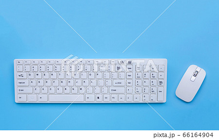 White computer keyboard and mouse on blue White computer keyboard and mouse on blue 66164904