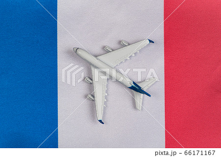 Flag of France and toy plane. Concept of air Flag of France and toy plane. Concept of air 66171167