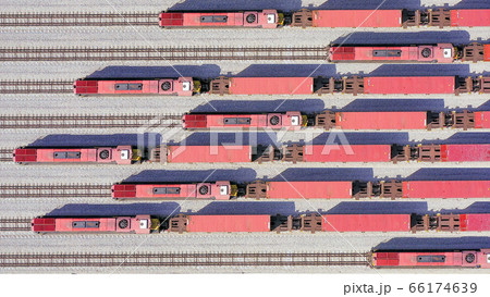 Freight Trains hauling a long load of Shipping Containers. Freight Trains hauling a long load of Shipping Containers. 66174639
