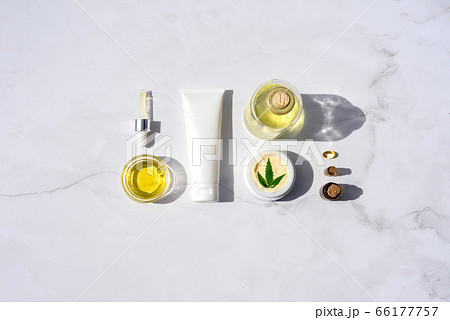Cosmetics CBD oil. Cosmetic Products with cannabis Oil, tincture Flat lay Cosmetics CBD oil. Cosmetic Products with cannabis Oil, tincture Flat lay 66177757