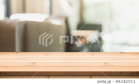 Empty wooden table top on abstract blur background 66182011