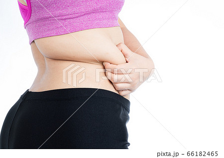 Fat woman holding excessive fat belly lower back, Fat woman holding excessive fat belly lower back, 66182465