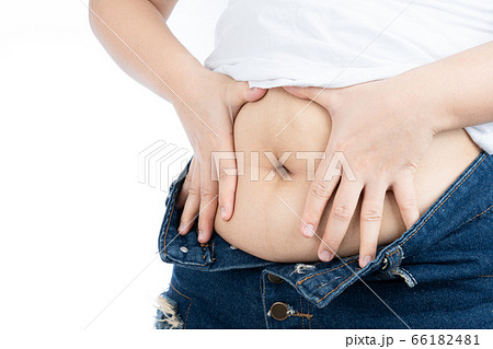 Fat woman holding excessive fat belly, overweight 66182481