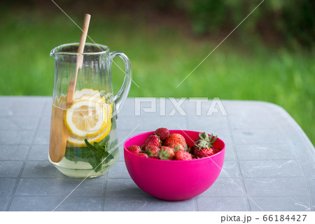 A jug of homemade lemonade  66184427