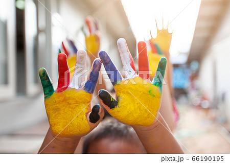 Cute asian child boy and girl with painted hands 66190195