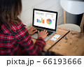 Close-up rear view of young business woman working 66193666