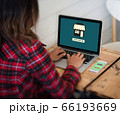 Online shopping website on laptop screen with 66193669