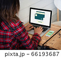 Online purchase credit card on laptop screen with 66193687