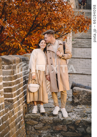 young couple kissing at the Great Wall of China young couple kissing at the Great Wall of China 66194098
