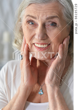 Portrait of beautiful senior woman posing at home 66195729