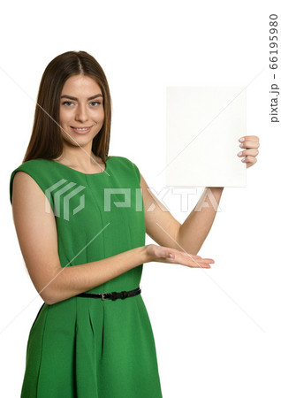 Woman in green dress with blank banner on white background Woman in green dress with blank banner on white background 66195980
